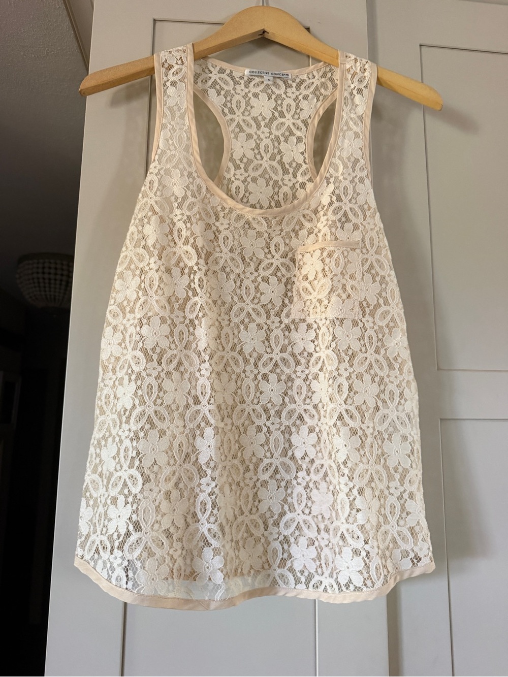 NWOT Collective Concepts cream racerback top, size S